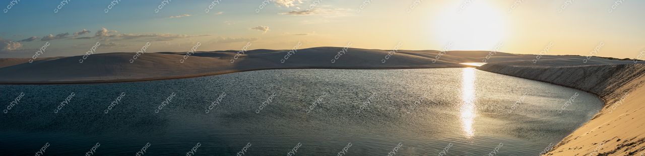 Tranquilidade Dourada: O espetáculo das dunas de areia ao pôr do sol