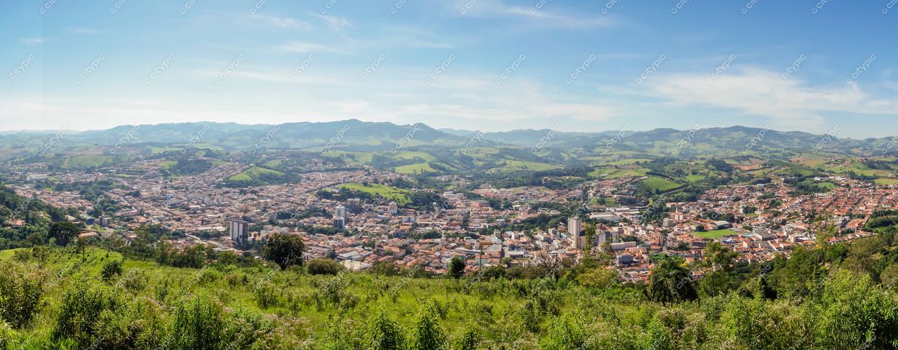Socorro, São Paulo, vista panorâmica em dia ensolarado com colinas, vegetação verde e urbanização ao fundo